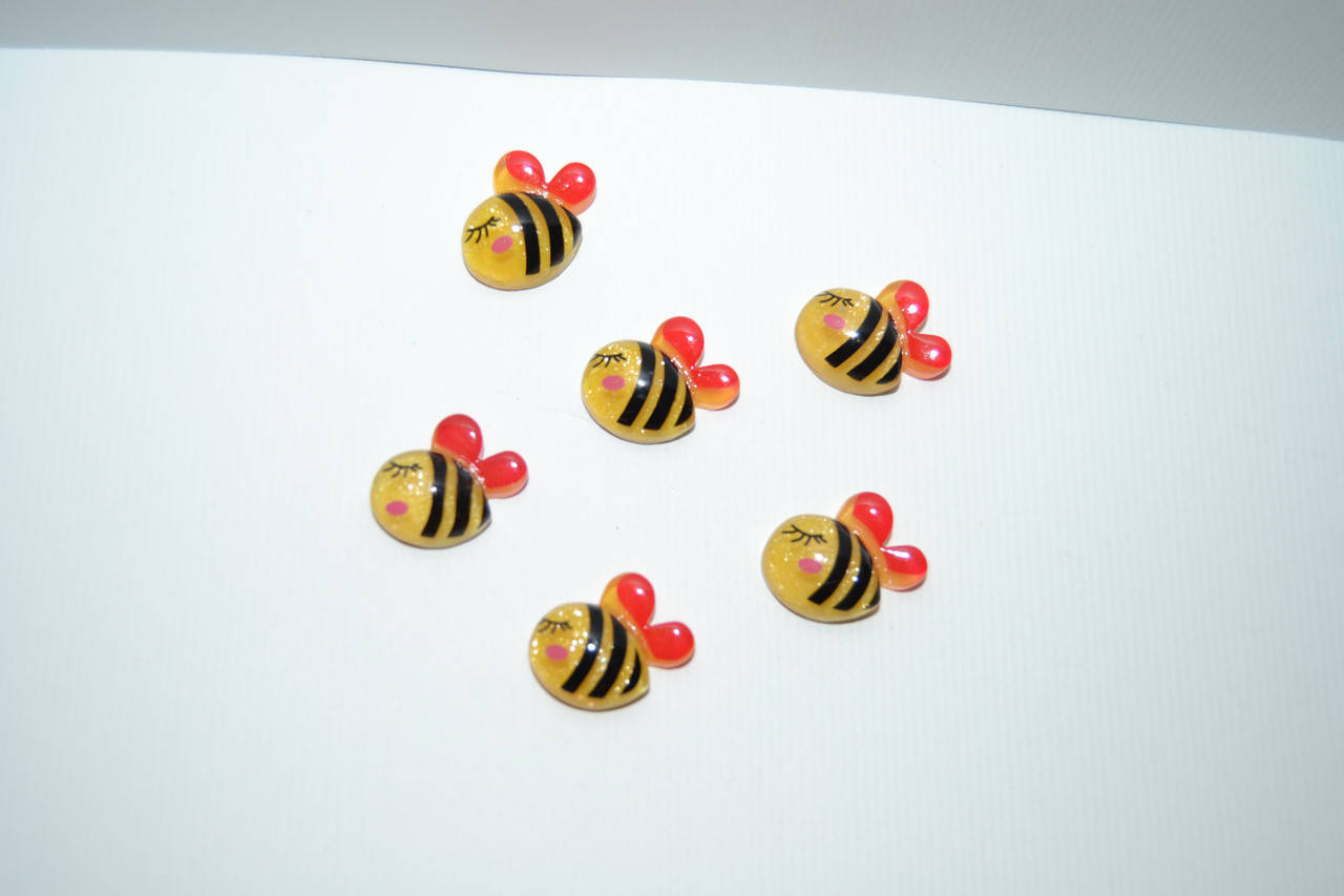 

Серединка Бджілка, пластик, 1,5*2,0см, колір- жовтий