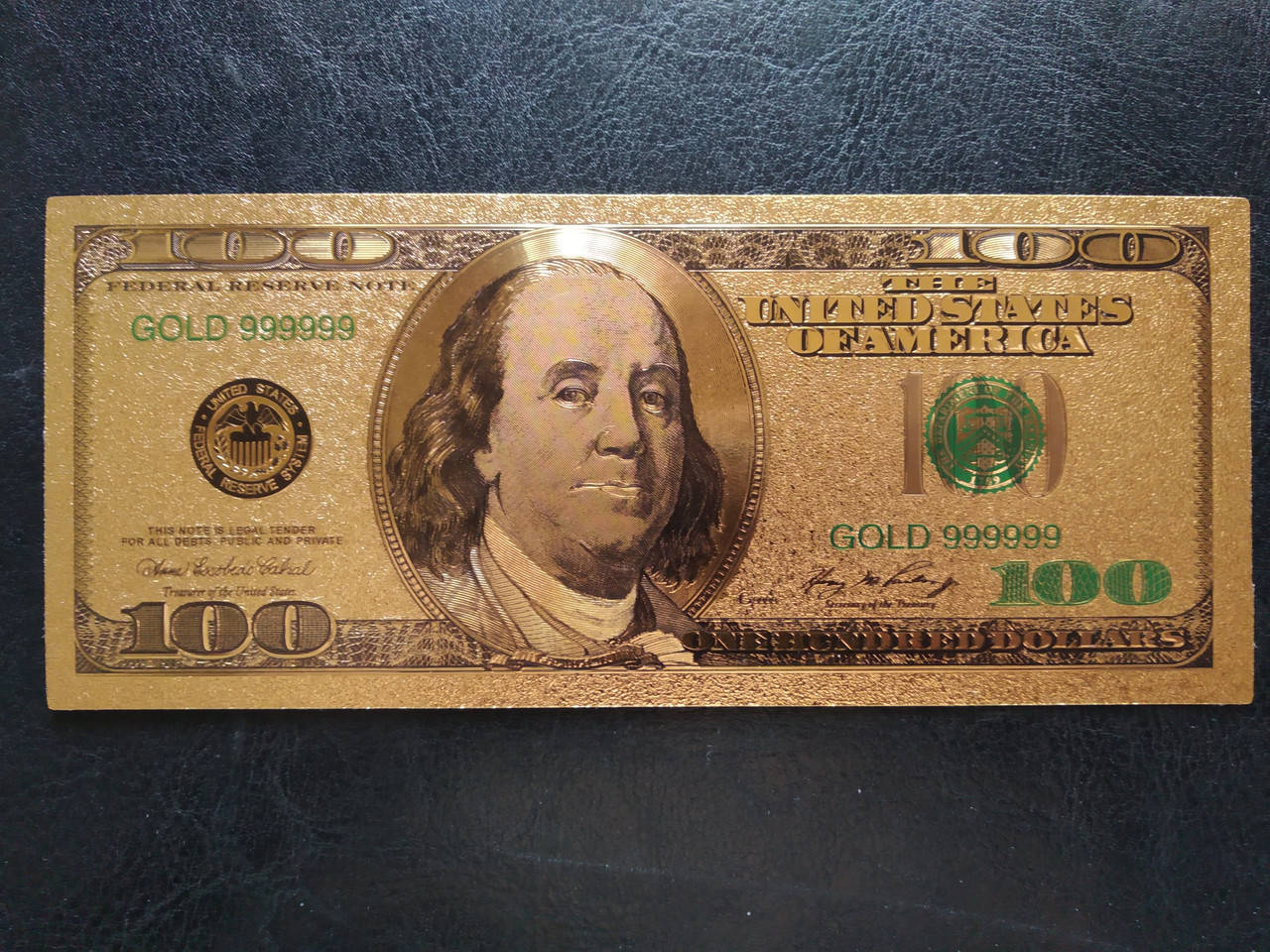 

Золотая сувенирная банкнота США 100 Dollars