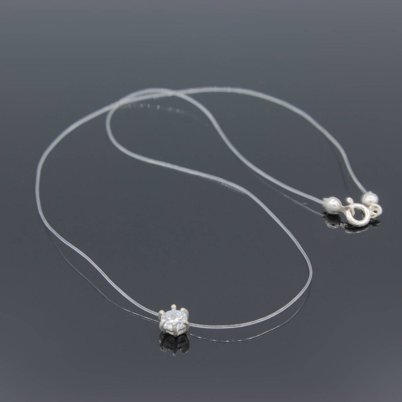

Серебряное колье на леске с фианитом