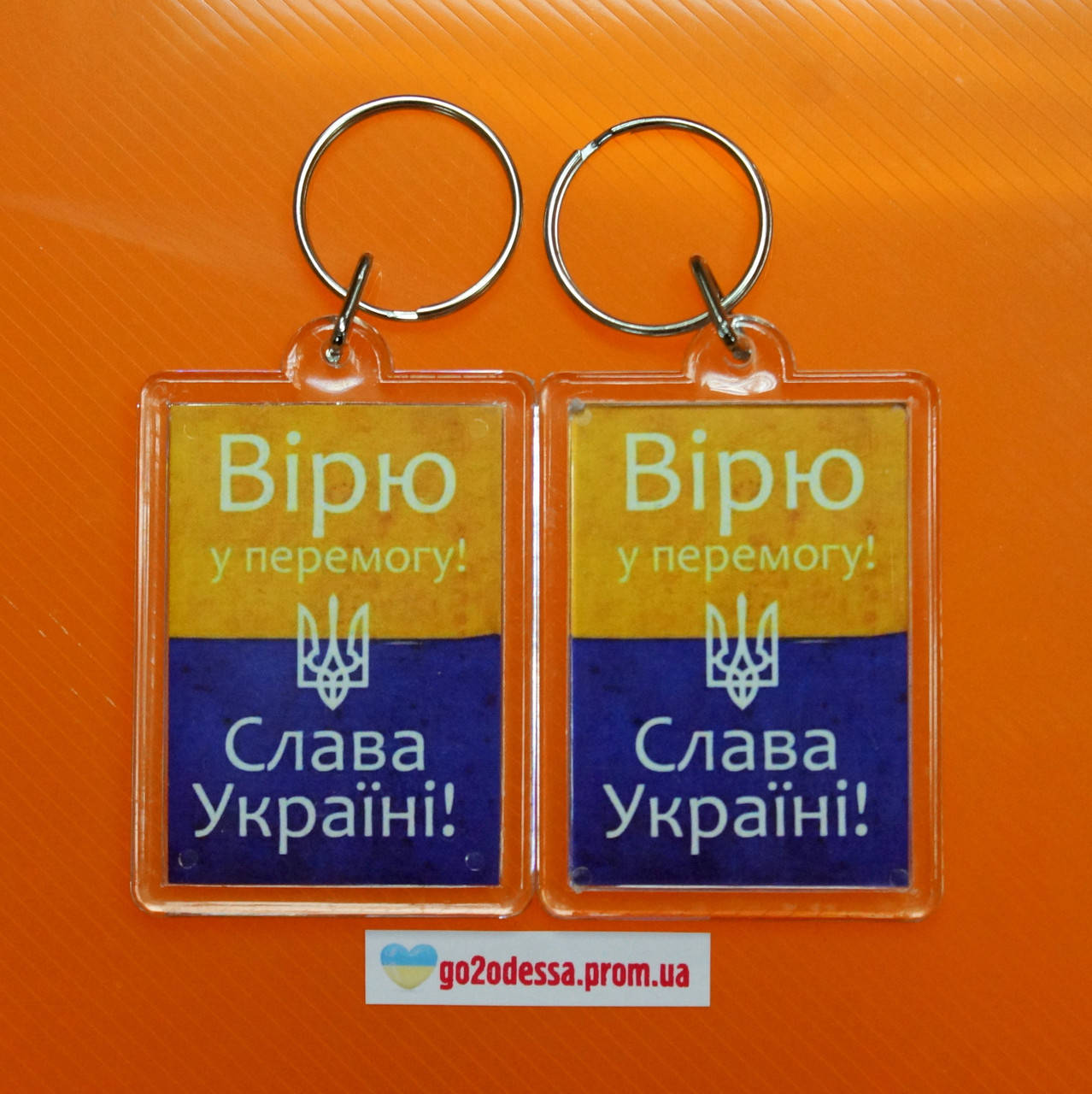 

Брелок "Вірю в перемогу! Слава Україні!", купити брелки оптом, купити брелок з символікою.
