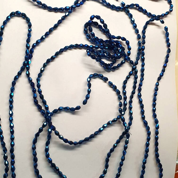 

4*6мм овал с гранями blue_hematite (Бусы стекло)