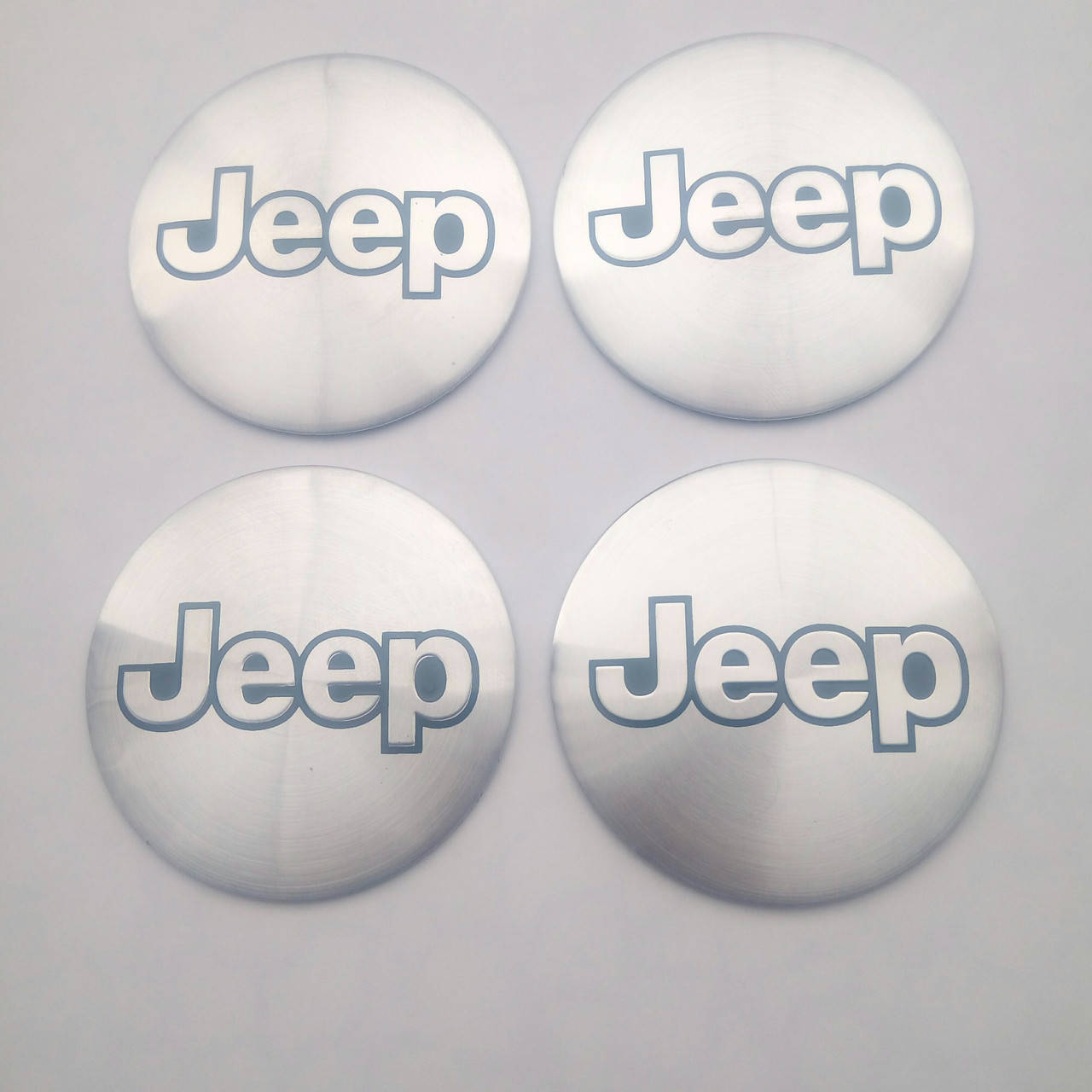 

Наклейка выпуклая на колпачок диска Jeep 56 мм серая, Светло-серый