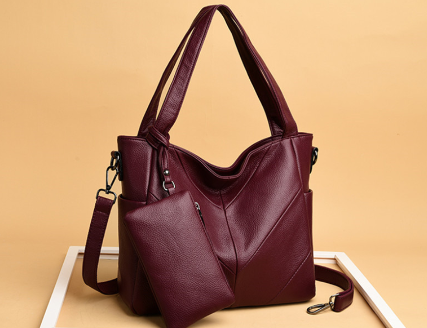 

Женская кожаная сумка Бордовый