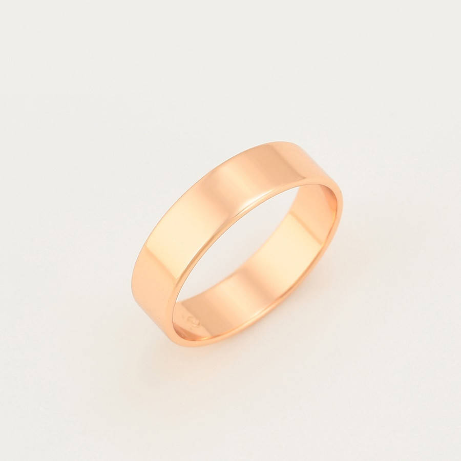 

Обручальное кольцо ширина 5 мм. позолота 18к фирма Xuping. Размер 23.