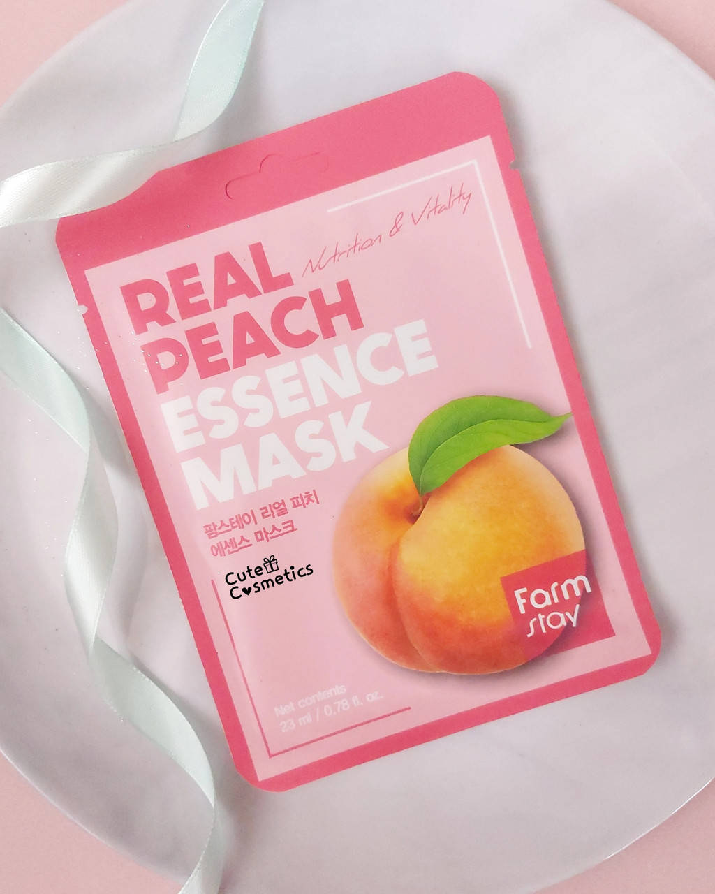 

Тканинна маска для обличчя Real Peach Essence Mask FarmStay.