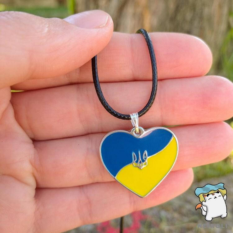 

Кулон "Серце України з гербом". Кольори прапор України ". Колір срібло, на шнурку