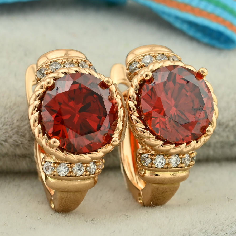 

Серьги Xuping 27553 размер 16х10 мм вес 4.7 г красные фианиты позолота 18К