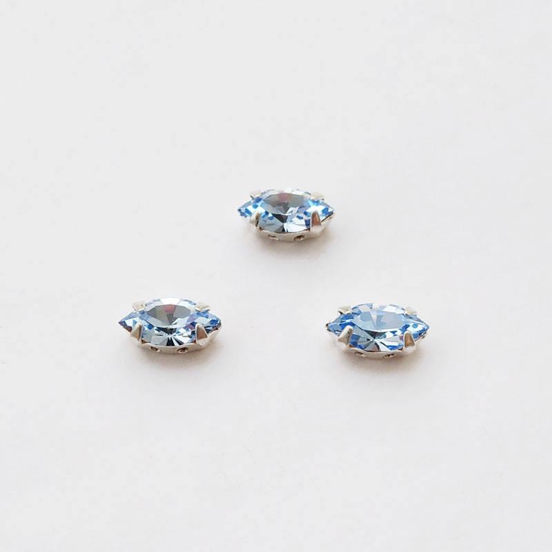 

Лодочки в цапах Preciosa (Чехия) 10x5 мм Light Sapphire/серебро, Голубой