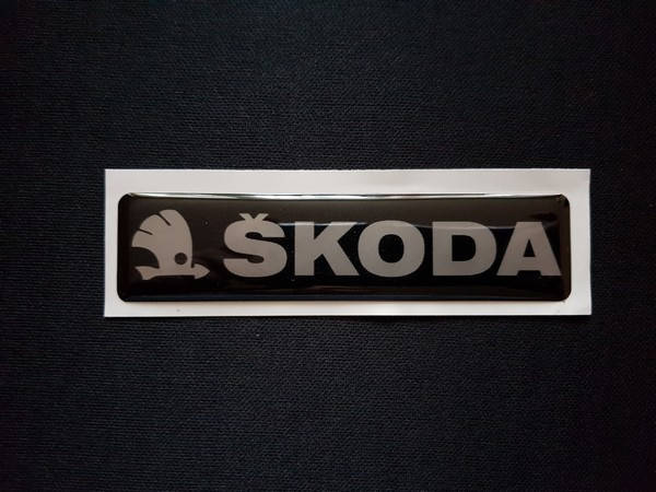 

Наклейка силиконовая Skoda черная (l=110мм, h=25мм), Черный