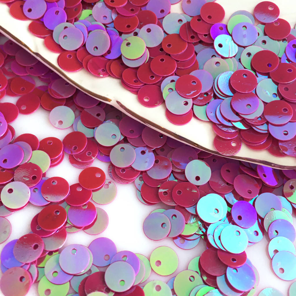 

Пайетки 6 мм. Смещенный центр. Вишневый (радужный). Упаковка 5 гр. (около шт)