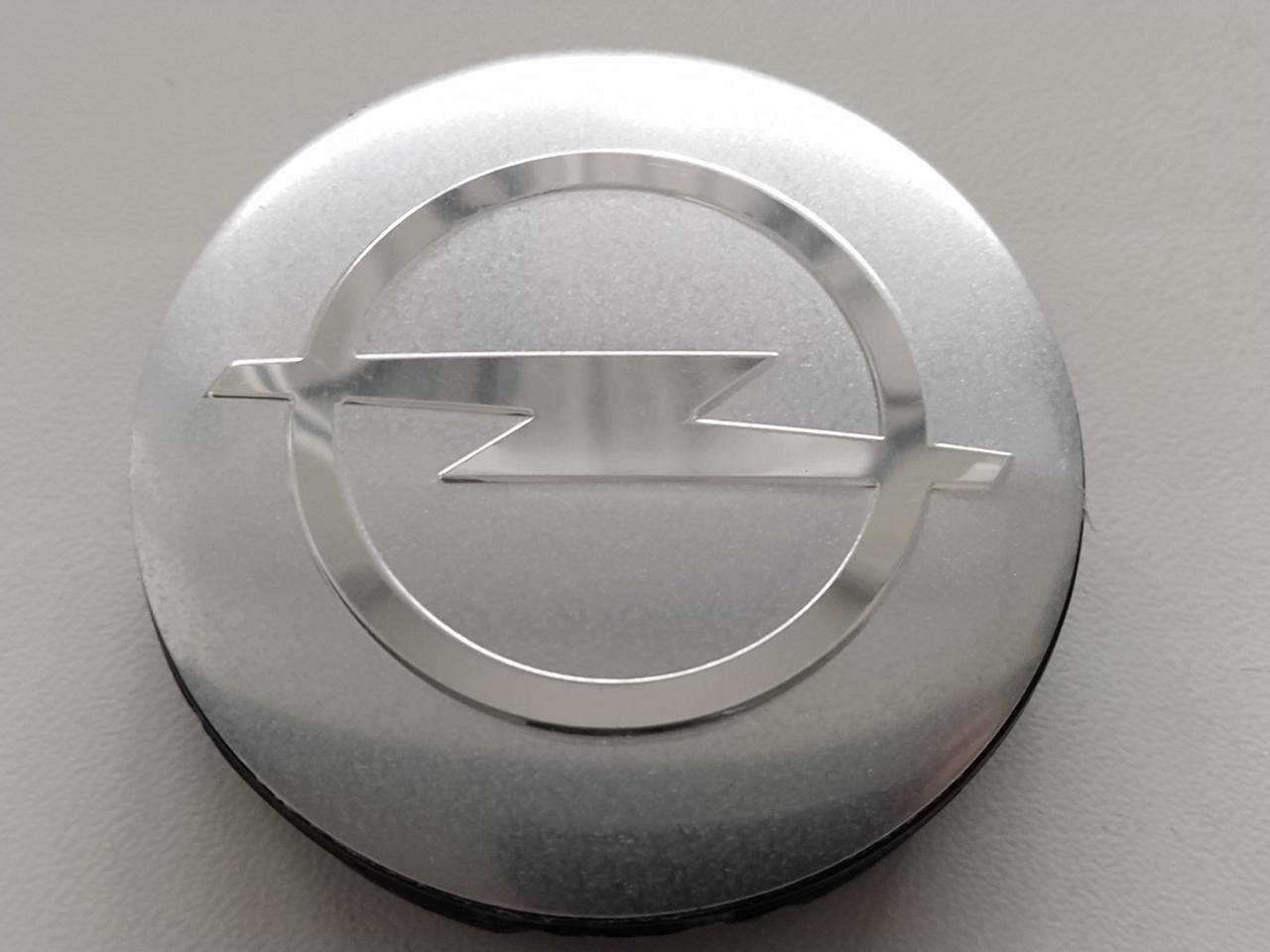

Колпачки заглушки в литые диски Opel 57/53/9 мм. Серебро