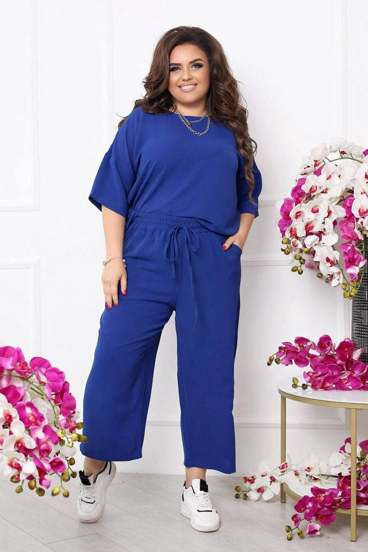 

Легкий женский брючный костюм блуза и широкие брюки размеры