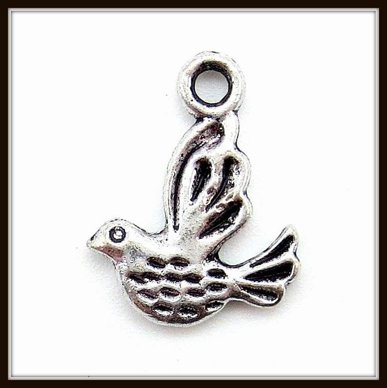 

Метал. подвеска "птица" серебро (1,1х1,4 см) 30 шт в уп.