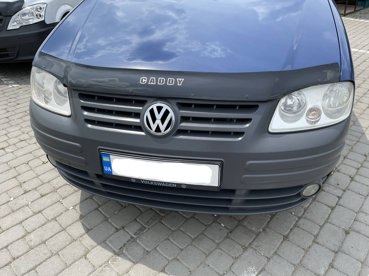 

Дефлектор капота, мухобойка Volkswagen Caddy 2004-2010