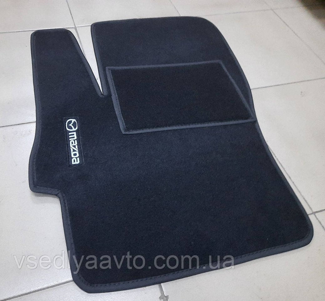 

Водительский коврик ворсовый MAZDA 3 (2003-2009)