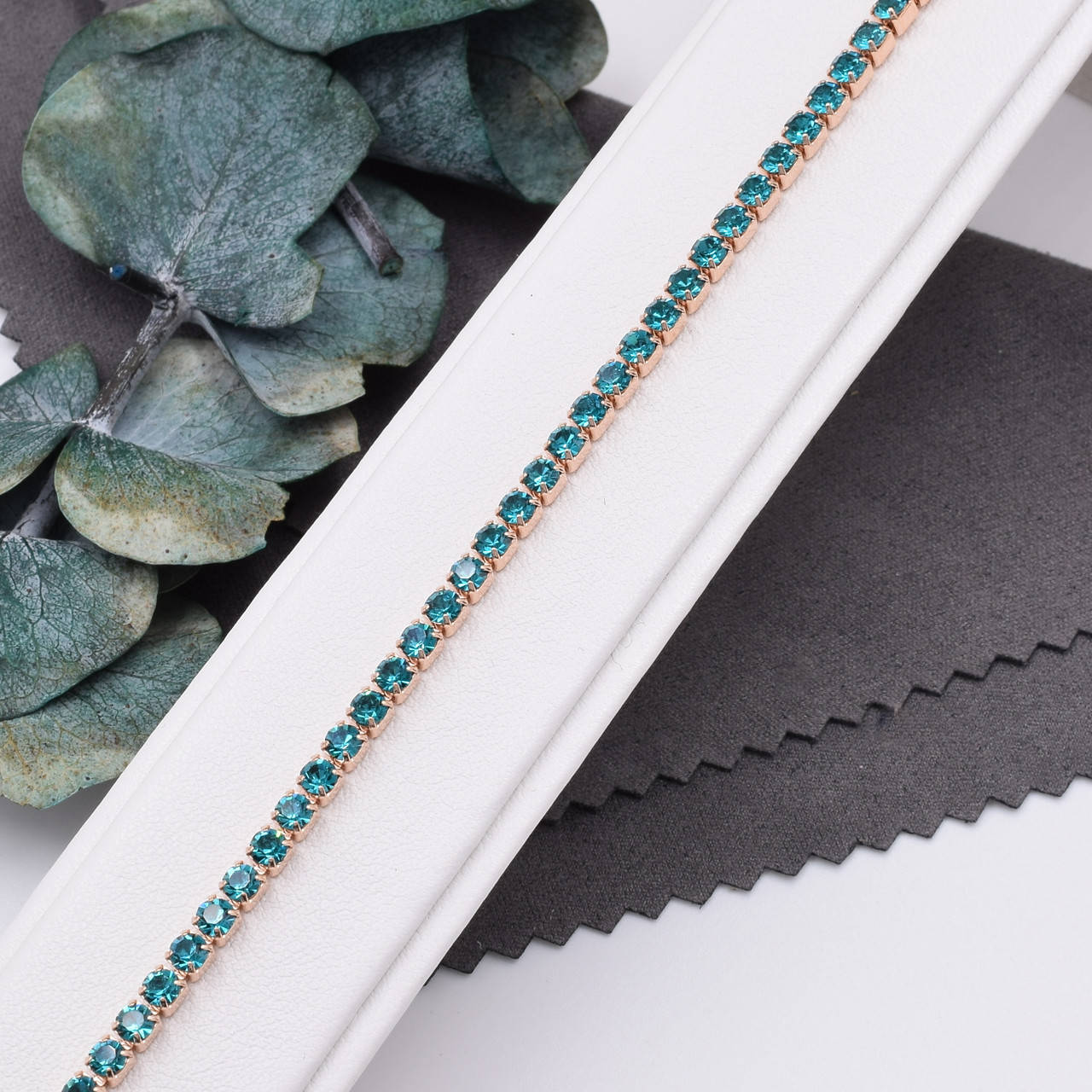 

Браслет Xuping Бриллианты Мэрилин 41277 ширина 3 мм бирюзовые РО фианиты позолота длина 17+2