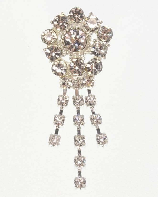 

Брошь "Кристальный цветочек с лучиками из страз"