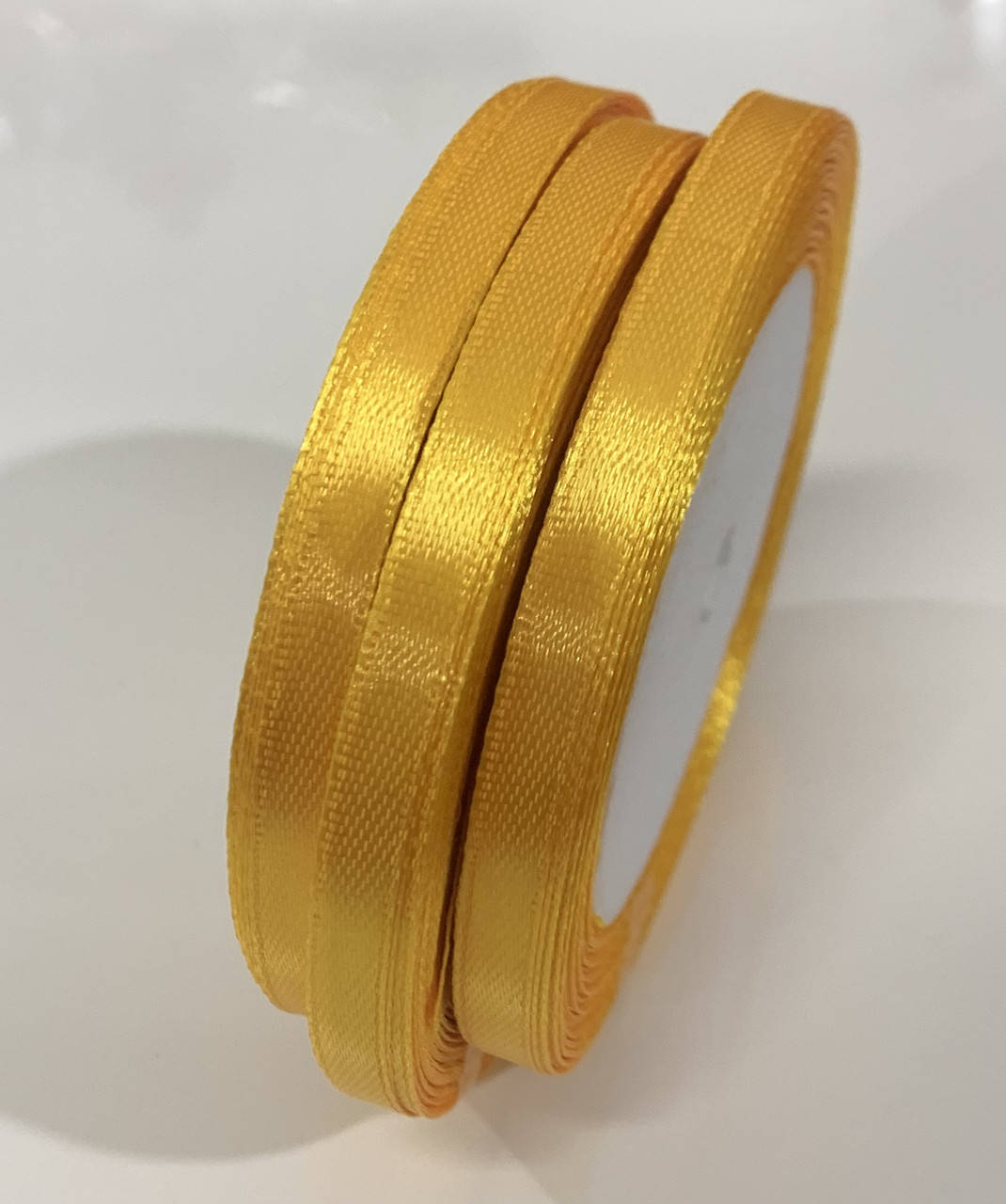 

Атласная лента 6 мм (23 м.) ярко-желтая, Желтый