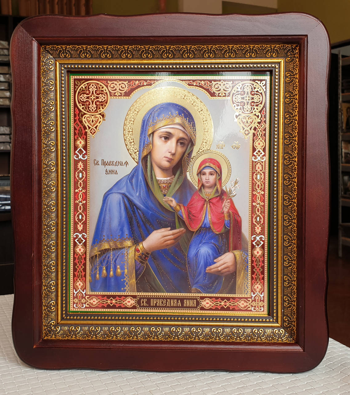 

Икона Святая праведная Анна в темном фигурном киоте под стеклом, размер киота 32×29,сюжет 20×24