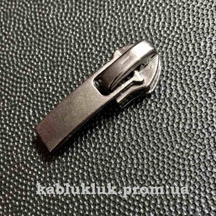 

Бегунок №7 на спиральную молнию с фиксатором, темный никель