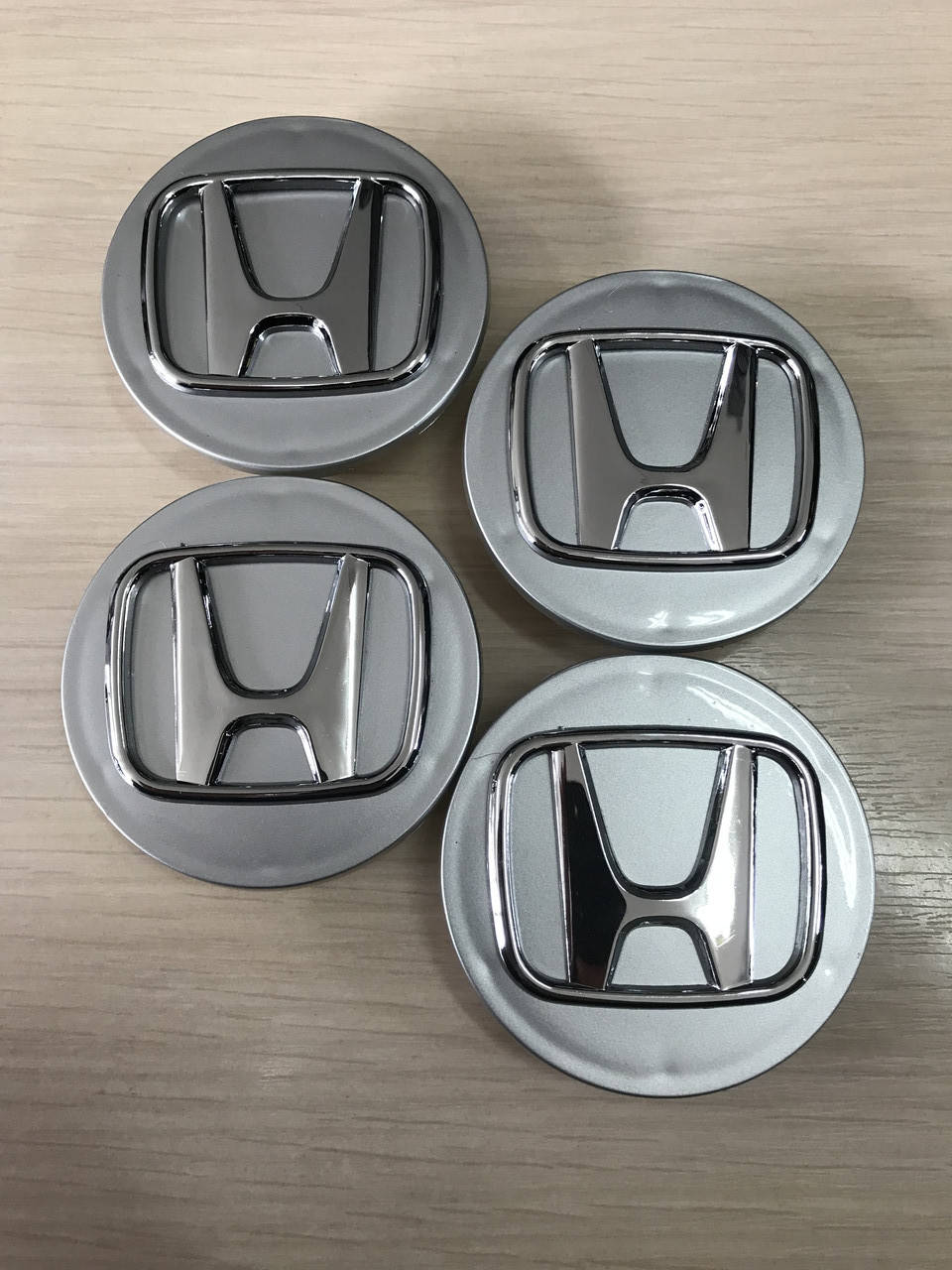 

Колпачки заглушки в литые диски Honda/ Хонда 70/64/12 мм. Серебро/Хром