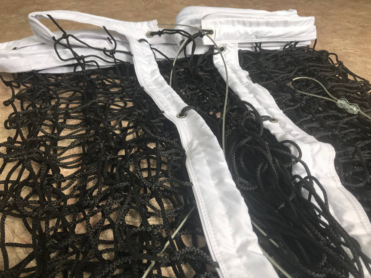 

Сетка волейбольная *Премьер Лига* яч. 100 х 100 мм. Д-р. шн. 4.5 мм. капрон