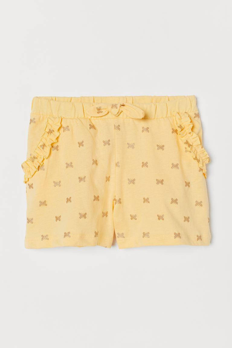 

Желтые трикотажные шорты Бабочки с блеском для девочки НМ, Желтый