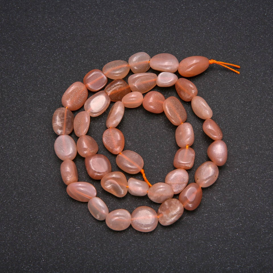 

Бусины из натурального камня Селенит галтовка d-8х12(+-)мм L-38см