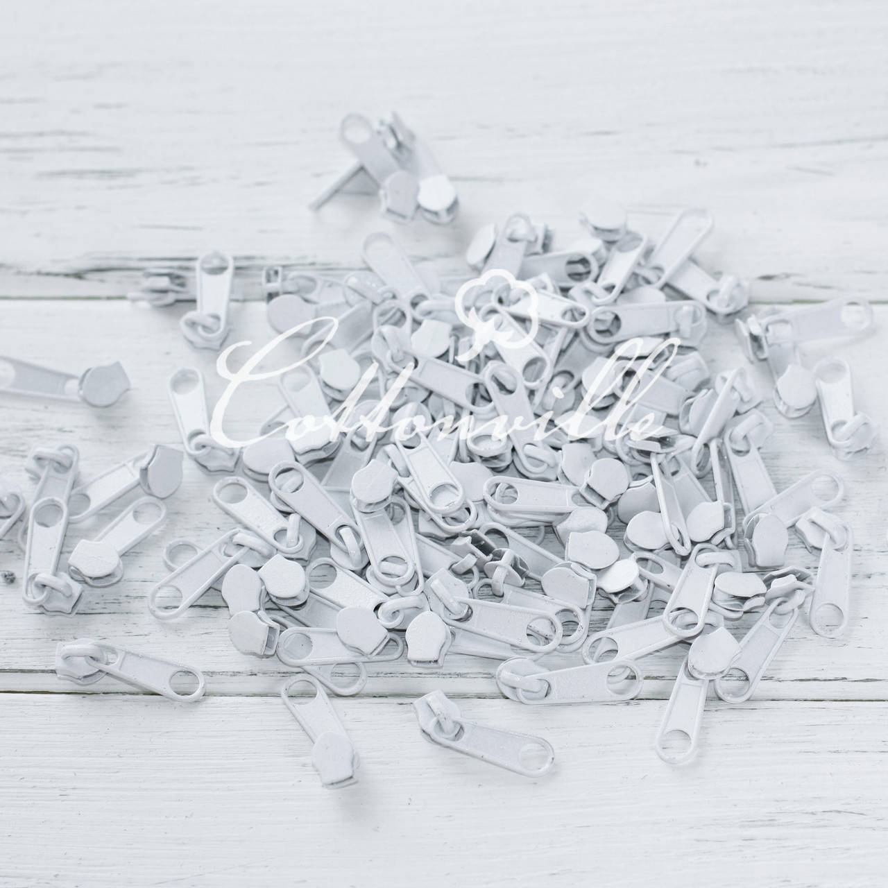 

Бегунки к молнии #3 белые, длинные, Белый