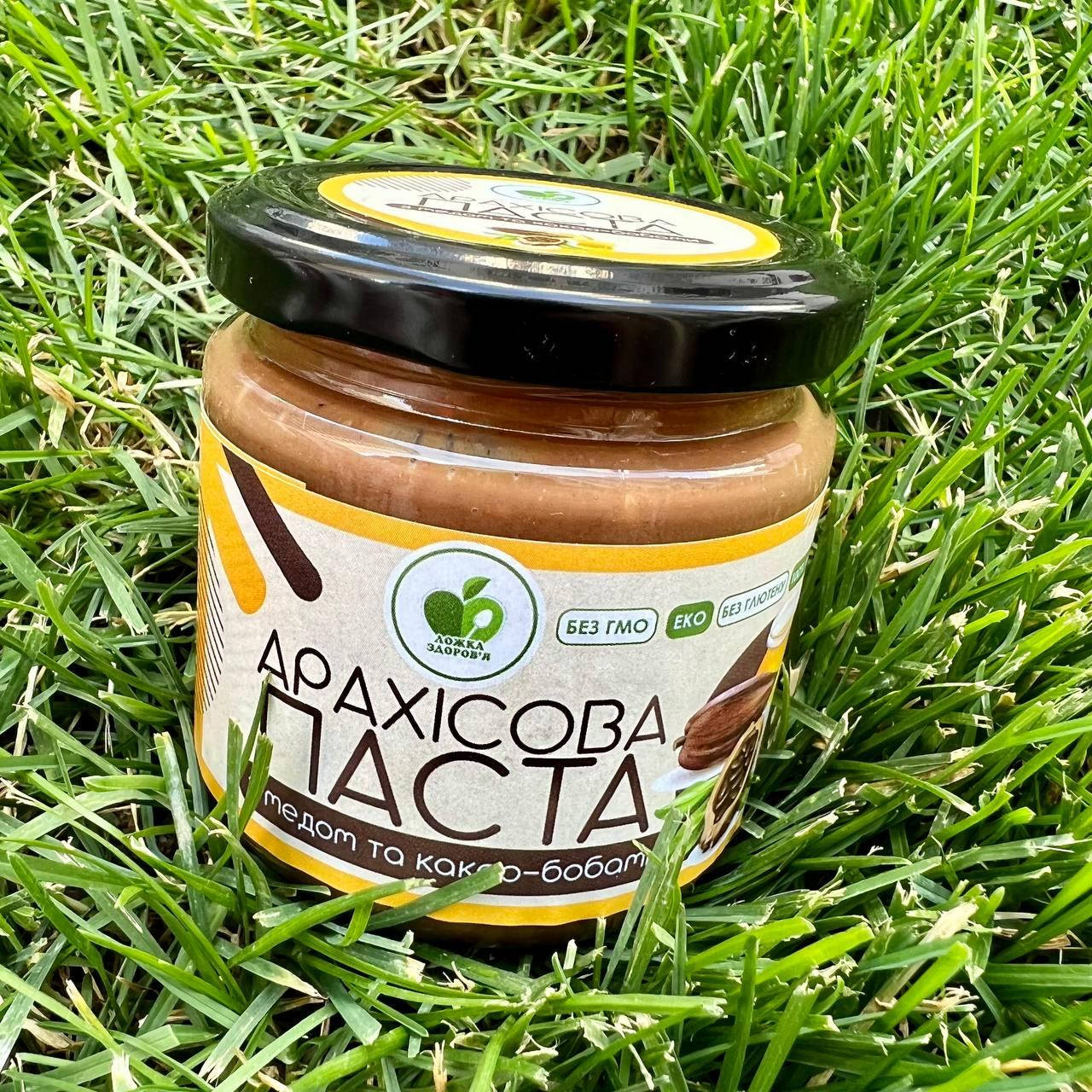 

Арахисовая паста без сахара с медом и какао бобами тертыми 200 грамм "Ложка Здоровья"