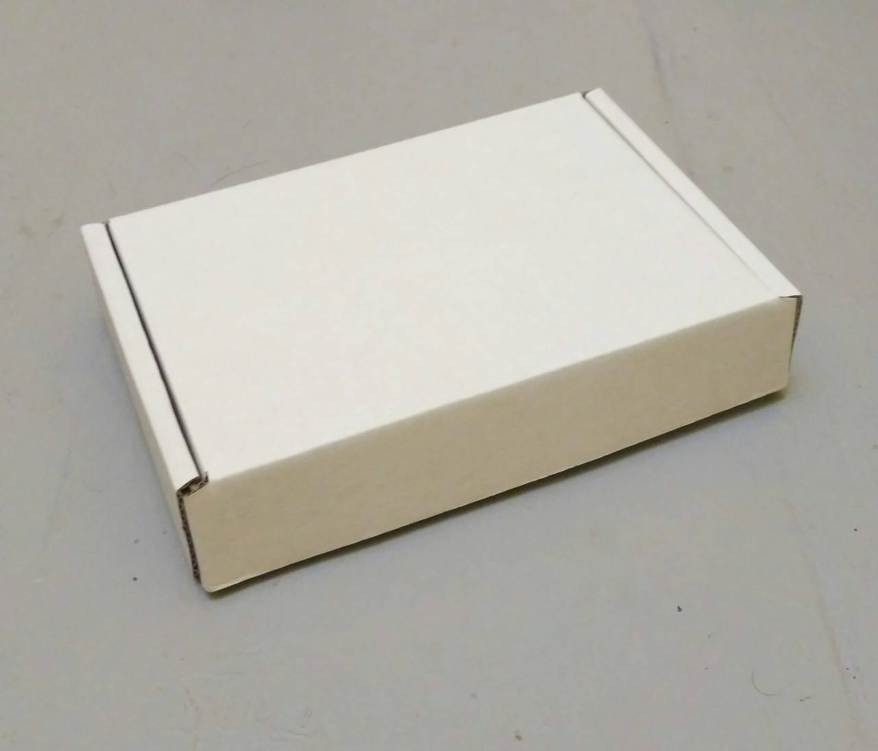 

Коробка БЕЛАЯ 152х105х32, Белый