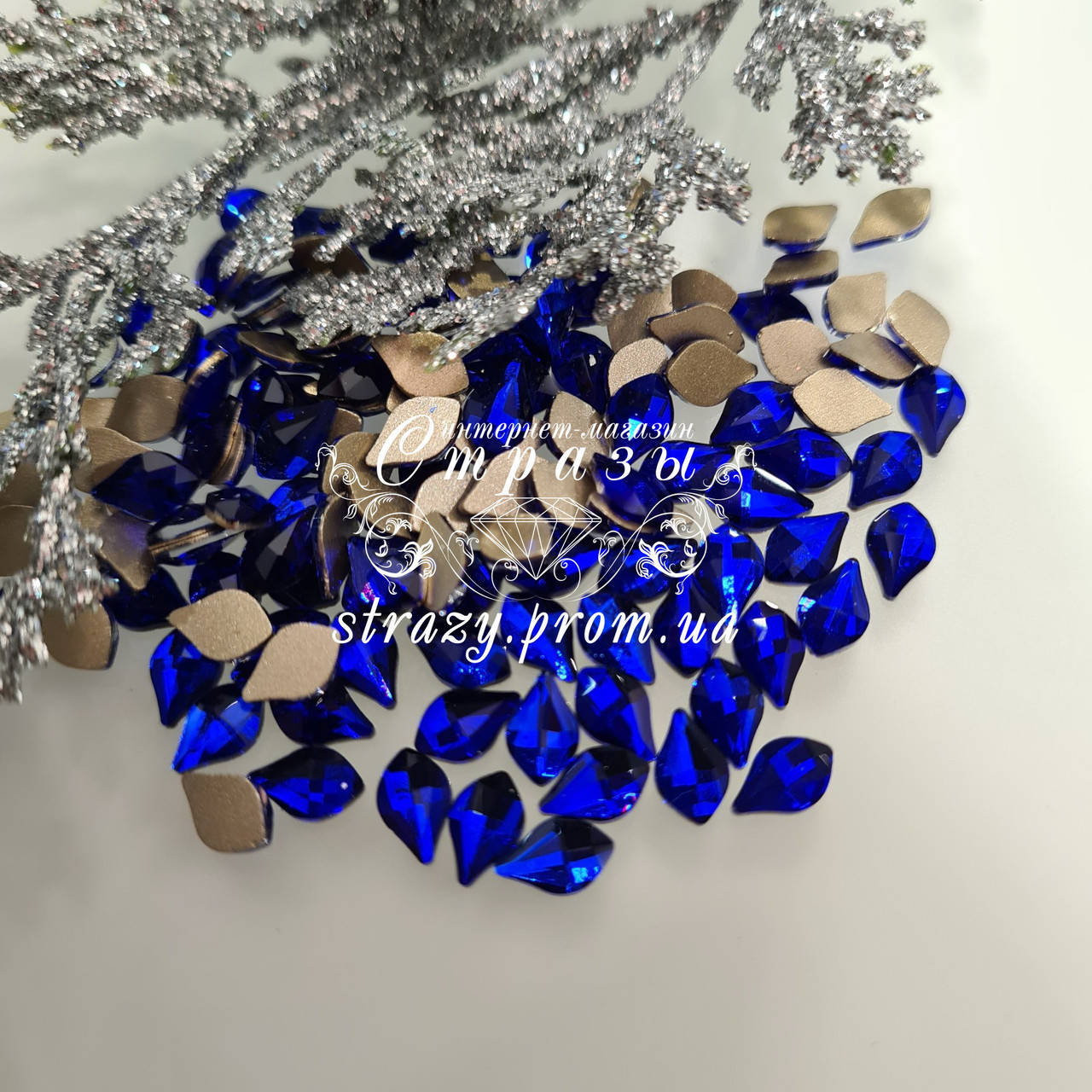 

Стразы фигурные 5*8мм Sapphire 20шт №20