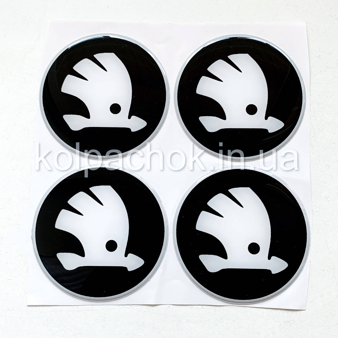 

Наклейки для колпачков на диски Skoda черные/белый лого (70мм)