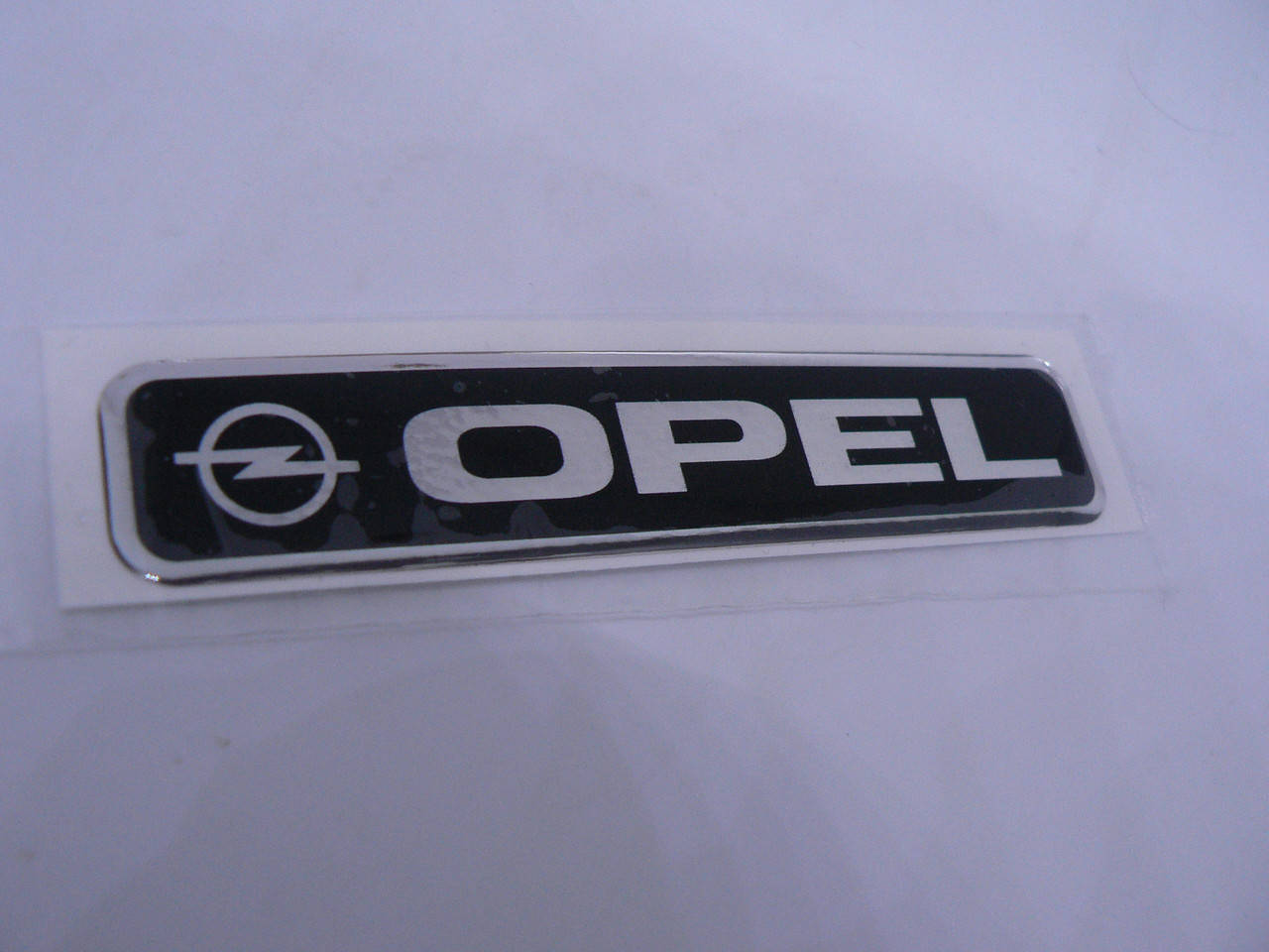 

Наклейка s надпись OPEL 100х20х0.8мм силиконовая на авто эмблема логотип Опель, Черный