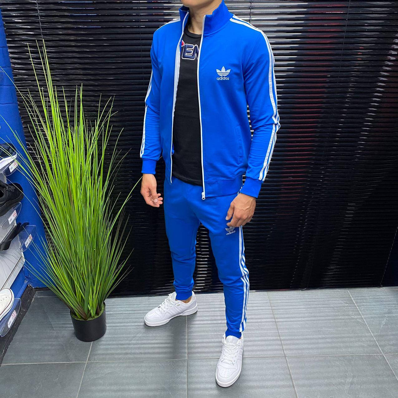 

Мужской спортивный костюм ADIDAS (синий с лампасом) 1:1 оригинал.