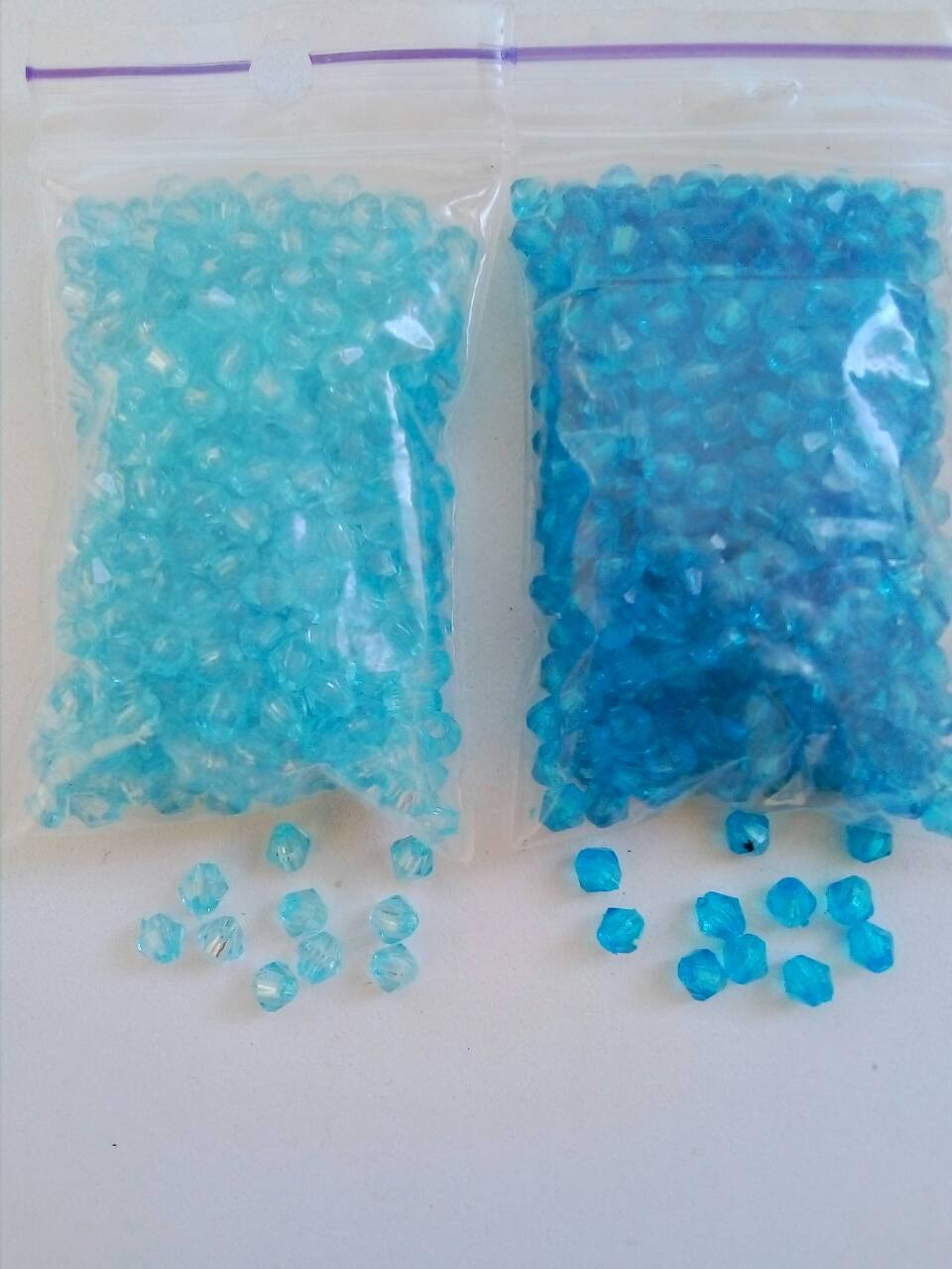 

Биконус гранёный №4 10г тёмно-бирюзовый (справа)