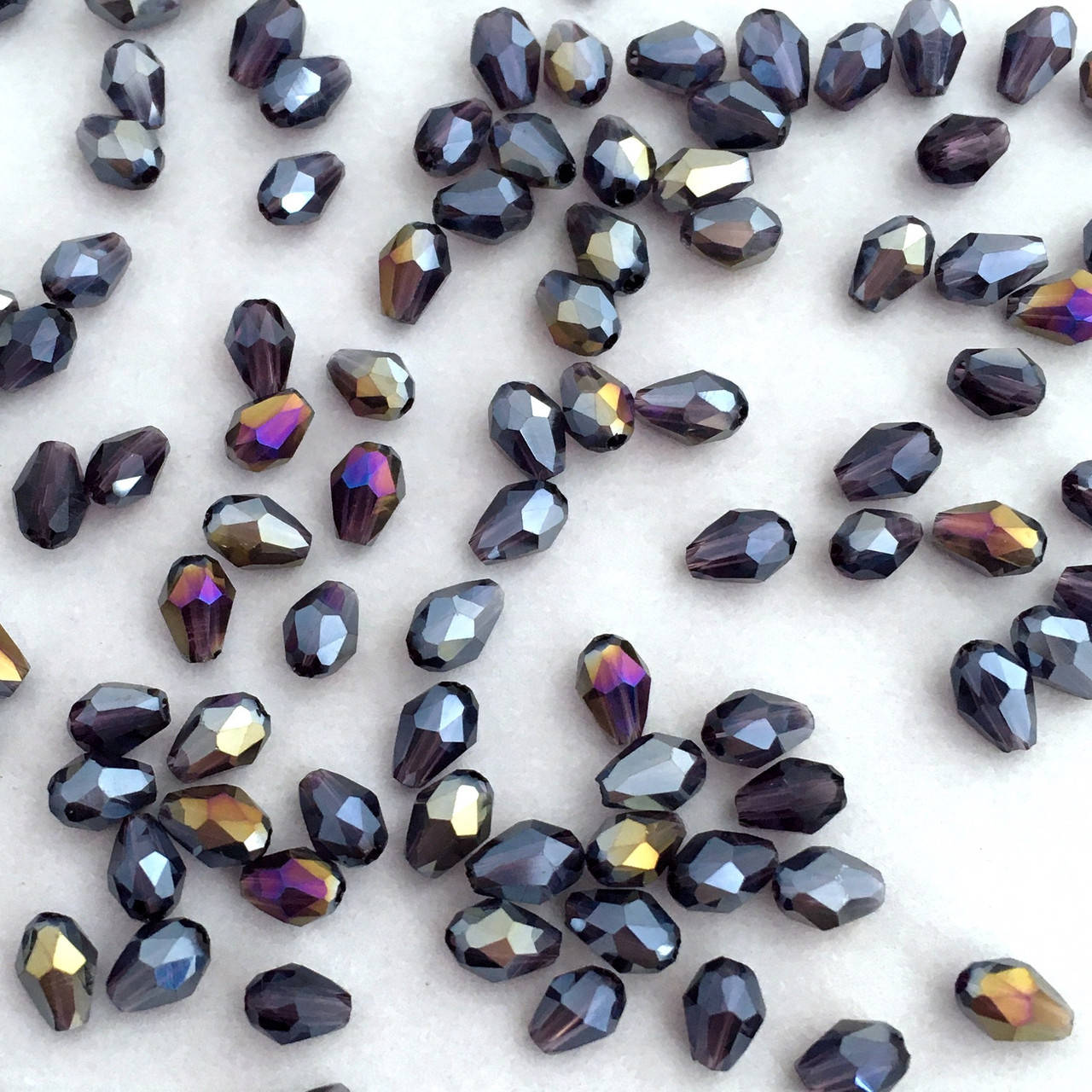 

Бусины хрустальные. Капля 3х5 мм. Фиолетовый прозрачный АБ. Упаковка 20 шт.