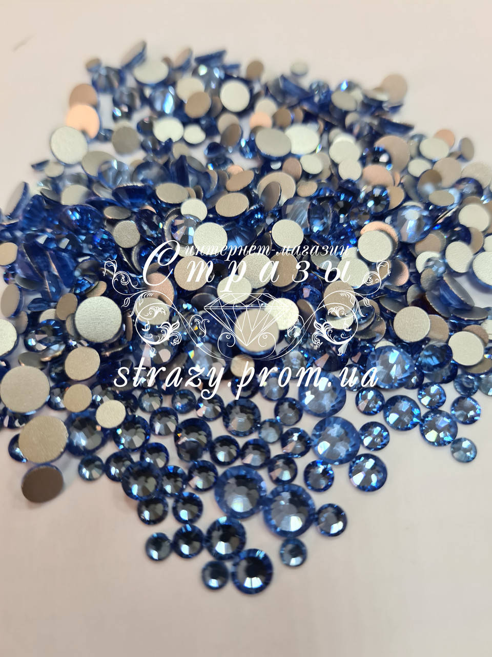 

Стразы Lt.Sapphire Микс размеров 1400шт (ss12,ss16,ss20,ss30) "Crystal Premium"