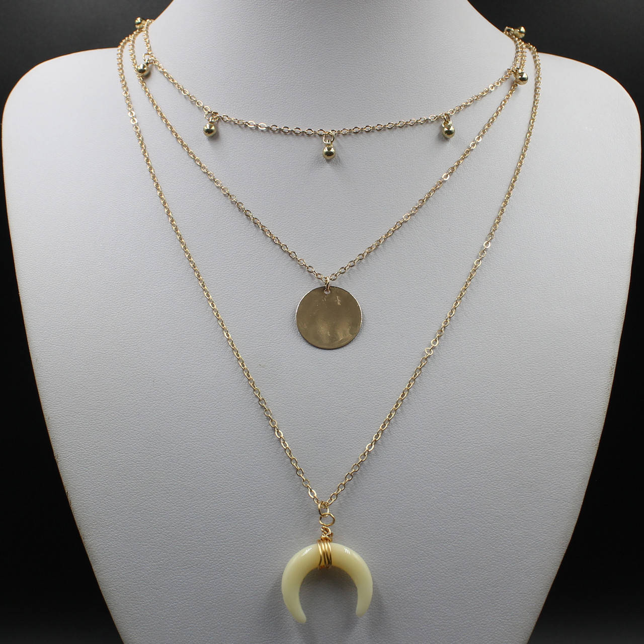 

Золотая многослойная цепочка с полумесяцем из белого агата и монетой 3 ряда Burberry