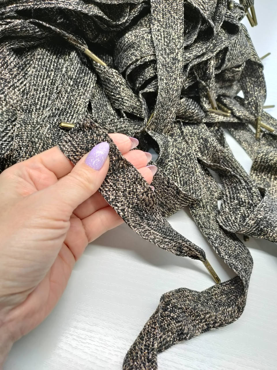 

Шнур (текстильный) №23 плоский черный с люрекс ширина 2.5см, 125см.