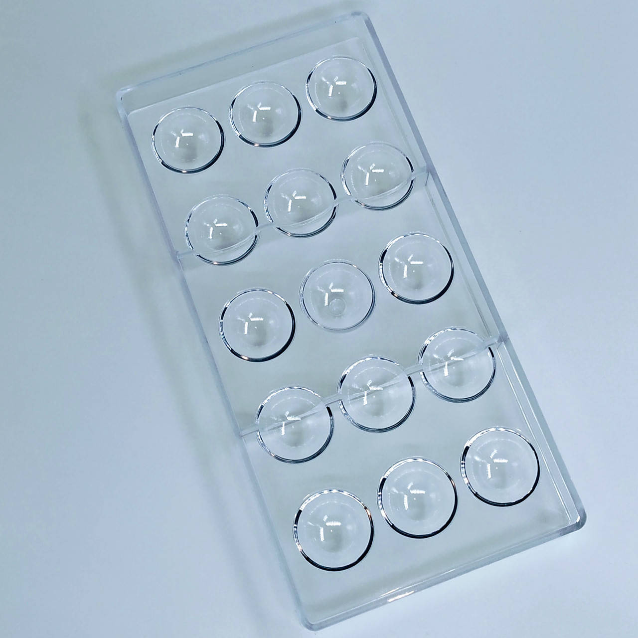 

Поликарбонатная форма для отлива конфет Полусферы 3.2 см