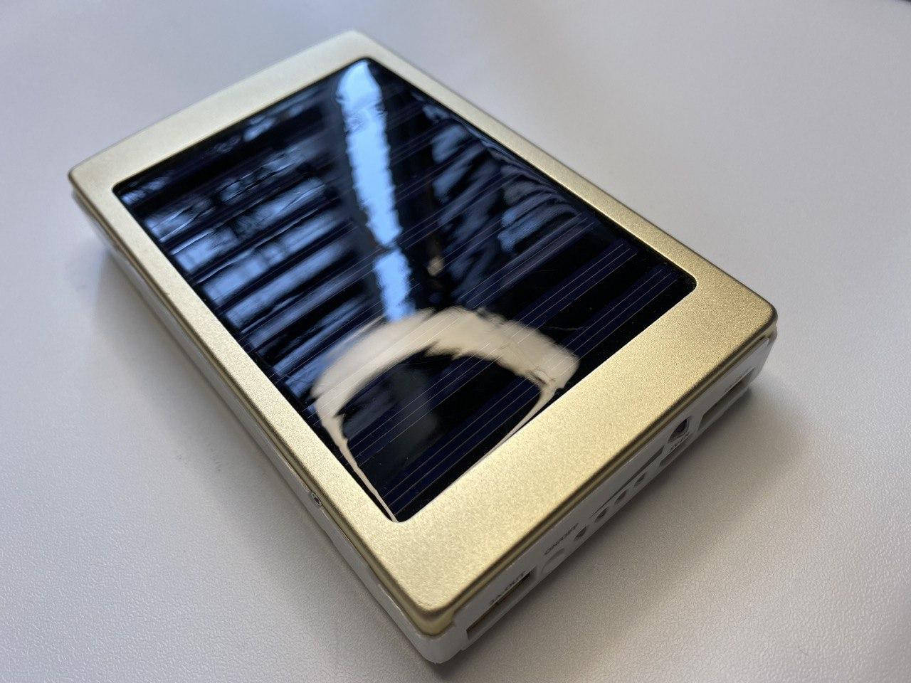 

Повербанк зарядное устройство Power Bank 20000 mAh Solar LED Солнечной панелью + фонарик