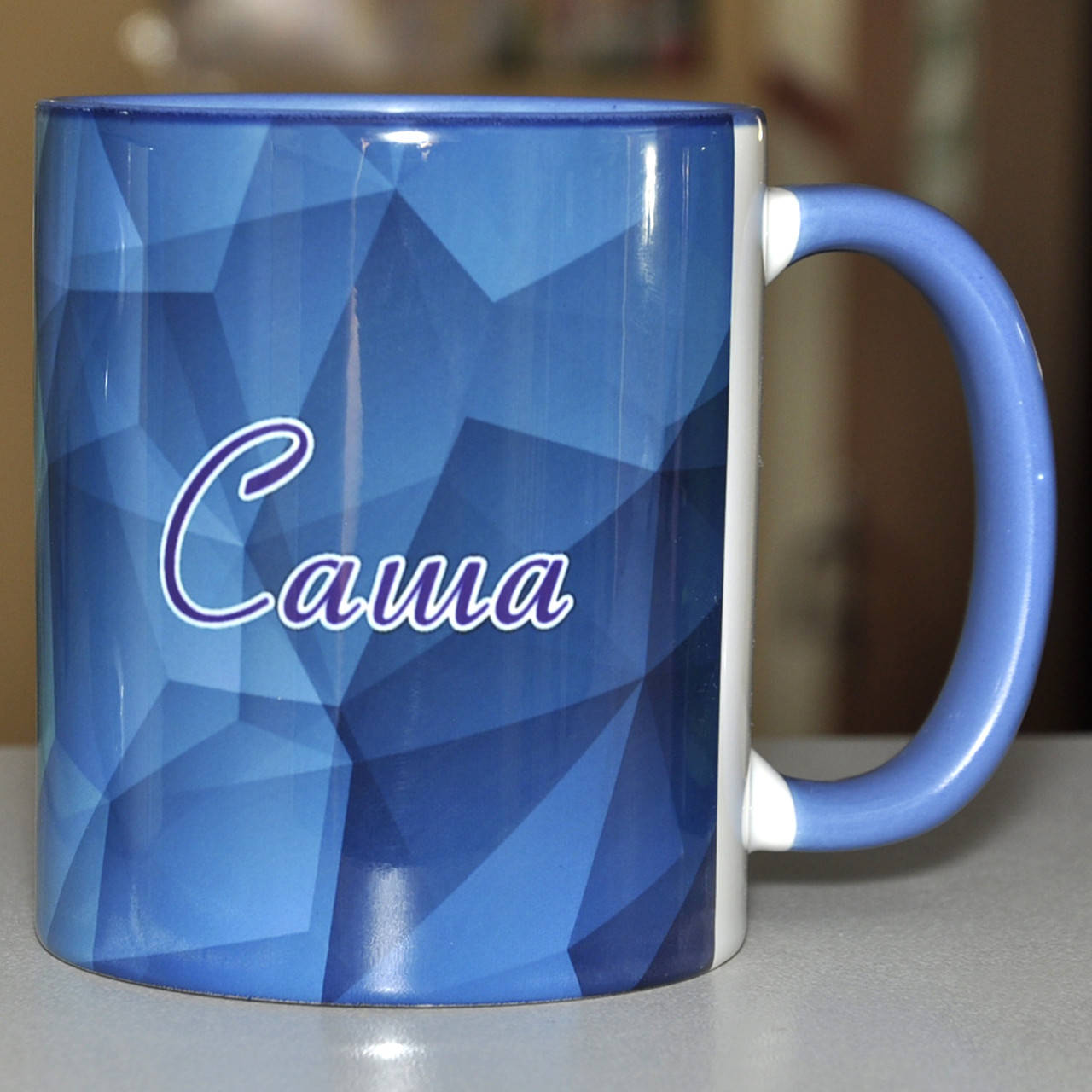 

Чашка ручка и серединка голубая с именем Саша