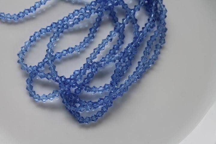

Биконус, 4\4 мм, нить (100 +- шт), цвет - синий прозрачные