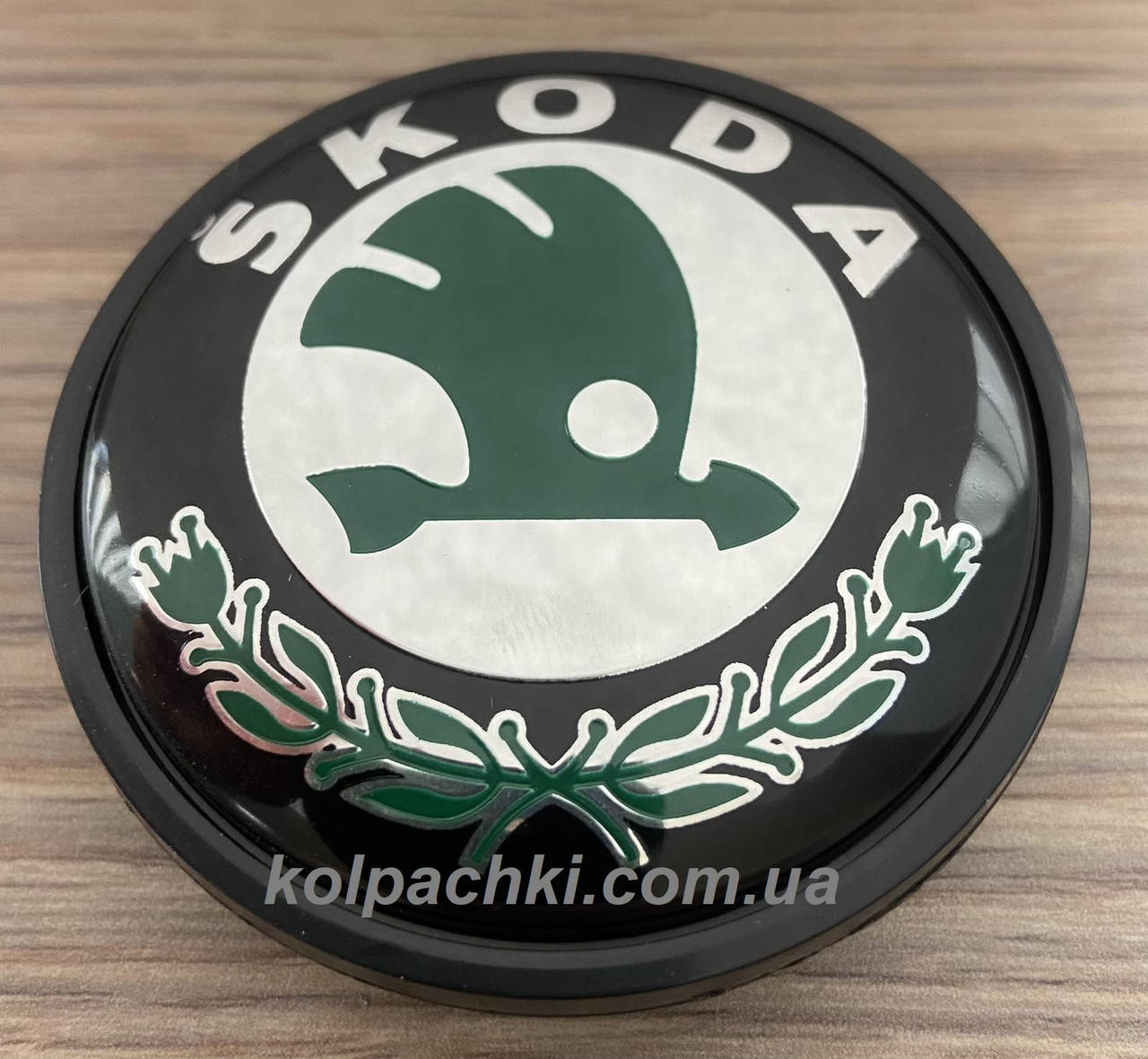 

Колпачки Skoda Шкода 65/56 мм черные с зеленым логотипом 65мм 56мм 3B7601171