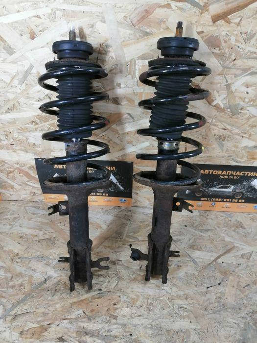 

Передние амортизаторы стойки в сборе 1.5 шевроле авео т-200 т-250 бу