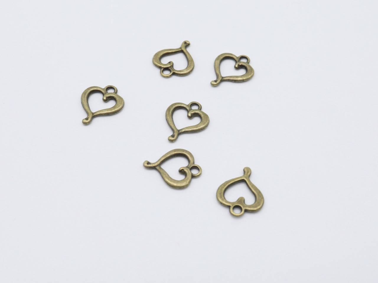

Металлические накладки. Цвет "античная бронза". Сердце. 18х14мм