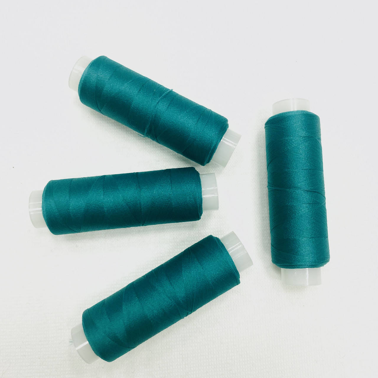 

Нитка Текстурированная для трикотажа Stretch 6629 цвет бирюзовый плотность 160 намотка 200м 100% полиэстер