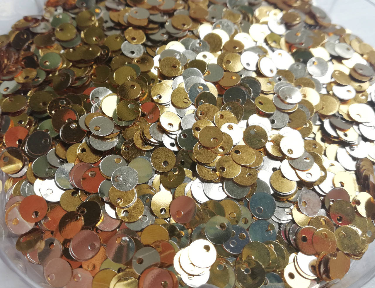 

Паєтки 5 мм з отвором збоку 5 г Honey Gold and Silver (двосторонні) Індія