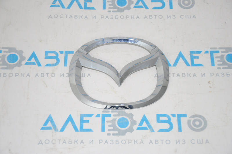 

Эмблема значок Mazda крышки багажника Mazda 6 13-19 GHK1-51-730 Мазда 6 2013-2017